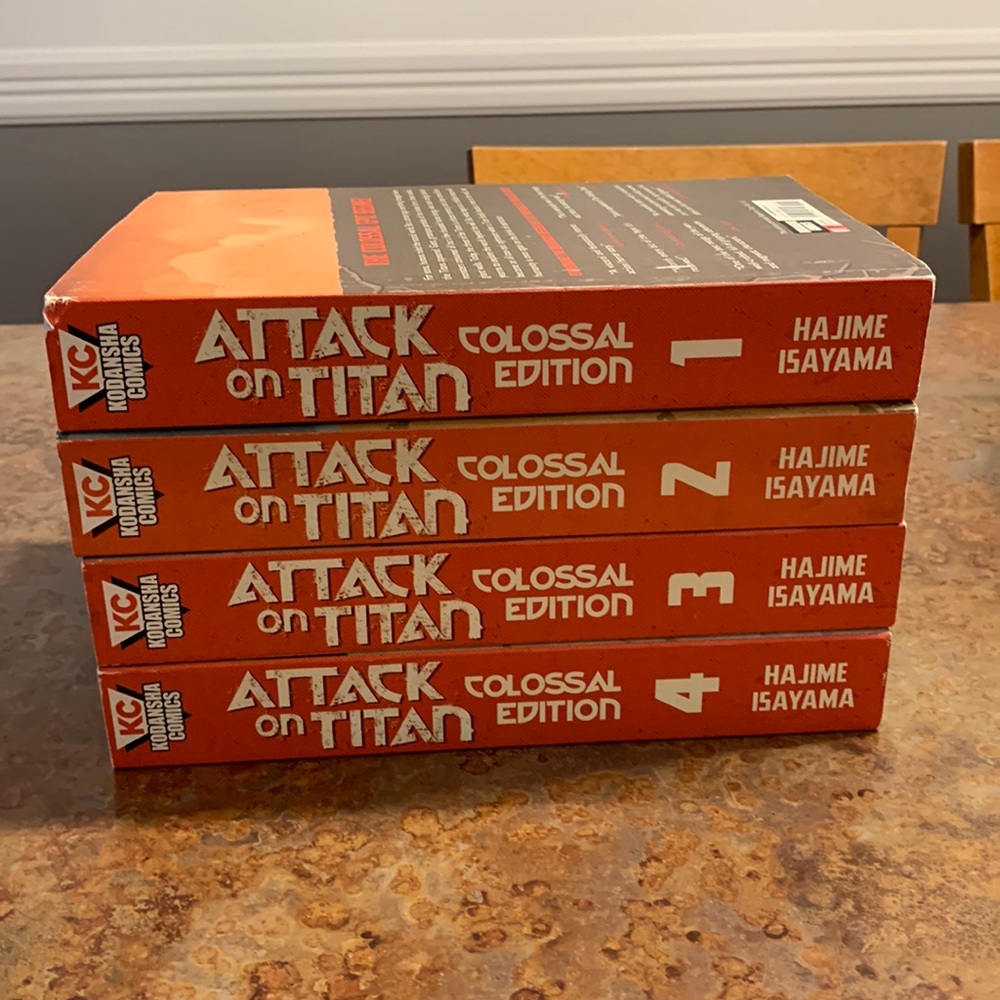 Attack on Titan Colossal Editions 1-4 by Hajime Isayama.